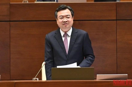 Bộ trưởng Xây dựng Nguyễn Thanh Nghị trả lời chất vấn của đại biểu Quốc hội tại phiên họp chiều 3/11. (Ảnh: ĐĂNG KHOA)