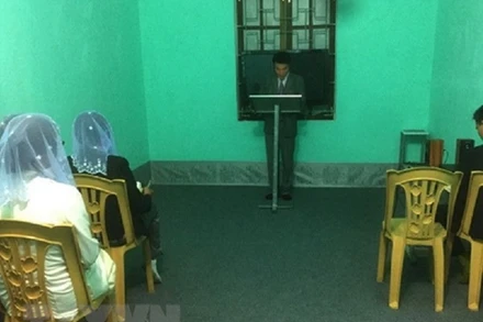 Một buổi truyền đạo trái phép của Hội thánh Đức Chúa Trời Mẹ, năm 2018. (Ảnh: TTXVN phát)