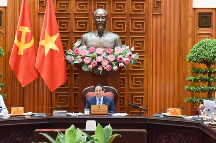 Thủ tướng Chính phủ Phạm Minh Chính chủ trì cuộc họp Thường trực Chính phủ với các bộ, ngành liên quan để chuẩn bị đàm phán thương mại với Hoa Kỳ. (Ảnh: TRẦN HẢI). 