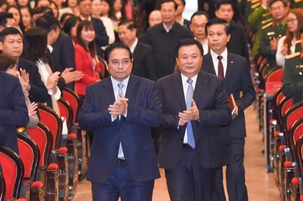 Thủ tướng Chính phủ Phạm Minh Chính và đồng chí Nguyễn Xuân Thắng tới dự và đồng chủ trì Hội nghị toàn quốc về giáo dục quyền con người. (Ảnh: TRẦN HẢI)