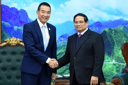 Thủ tướng Phạm Minh Chính và Bộ trưởng Ngoại giao Thái Lan Maris Sangiampongsa. (Ảnh: TRẦN HẢI)