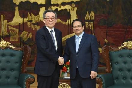 Thủ tướng Chính phủ Phạm Minh Chính và Bộ trưởng Ngoại giao Hàn Quốc. (Ảnh: TRẦN HẢI)