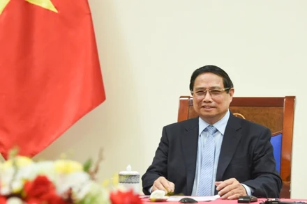 Thủ tướng Phạm Minh Chính điện đàm với Thủ tướng Malaysia Anwar Ibrahim. (Ảnh: TRẦN HẢI)