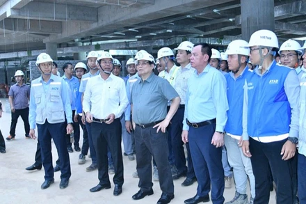 Thủ tướng Phạm Minh Chính thị sát, kiểm tra tiến độ xây dựng Nhà ga hành khách Cảng hàng không quốc tế Long Thành.(Ảnh: THANH GIANG)