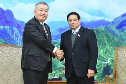 Thủ tướng Phạm Minh Chính và ông Nagao Yutaka, Chủ tịch Tập Đoàn Yamato Holdings (Nhật Bản). (Ảnh: TRẦN HẢI)