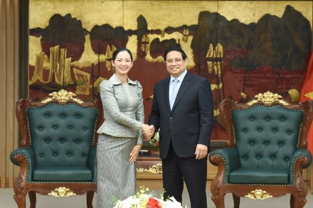 Thủ tướng Chính phủ Phạm Minh Chính và Bộ trưởng Thương mại Campuchia Cham Nimul. (Ảnh: TRẦN HẢI)