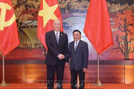 Đồng chí Trần Cẩm Tú, Ủy viên Bộ Chính trị, Thường trực Ban Bí thư và đồng chí Thái Kỳ, Ủy viên Thường vụ Bộ Chính trị, Bí thư Ban Bí thư, Chánh Văn phòng Trung ương Đảng Cộng sản Trung Quốc. (Ảnh: TTXVN) 