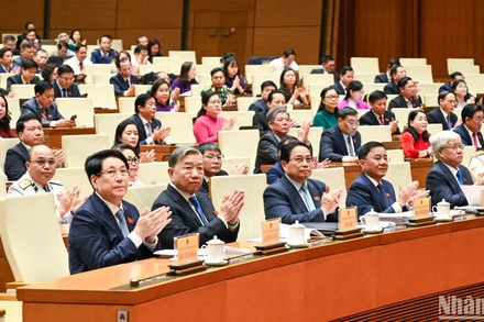 Lãnh đạo Đảng, Nhà nước và các đại biểu Quốc hội tại phiên bế mạc Kỳ họp thứ 8. (Ảnh: DUY LINH) 