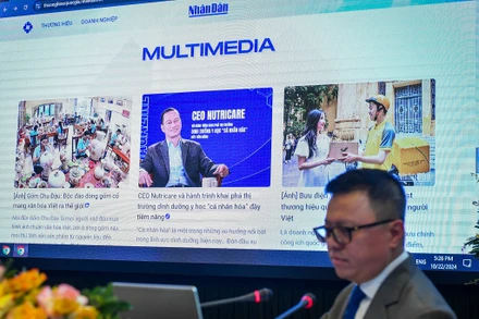Đồng chí Lê Quốc Minh, Ủy viên Trung ương Đảng, Tổng Biên tập Báo Nhân Dân, Phó Trưởng ban Tuyên giáo Trung ương, Chủ tịch Hội Nhà báo Việt Nam giới thiệu về chuyên trang Thương hiệu quốc gia trên Báo Nhân Dân. (Ảnh: THÀNH ĐẠT)