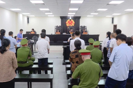 Quang cảnh phiên tòa sáng 26/8.