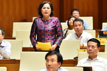 Thống đốc Ngân hàng Nhà nước Việt Nam Nguyễn Thị Hồng giải trình, làm rõ ý kiến đại biểu Quốc hội nêu tại phiên thảo luận. (Ảnh: THỦY NGUYÊN) 