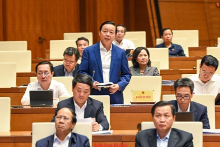 Bộ trưởng Tài nguyên và Môi trường Trần Hồng Hà giải trình về những tồn tại trong công tác quản lý đất đai. (Ảnh: DUY LINH)