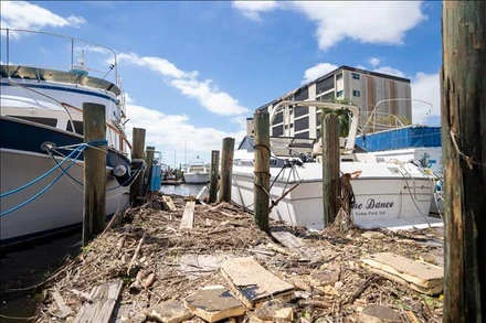 Cảnh đổ nát sau bão Ian ở Fort Myers, bang Florida (Mỹ) ngày 29/9/2022. (Ảnh: THX/TTXVN)