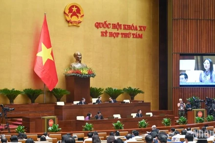 Quốc hội thảo luận về dự án Luật sửa đổi, bổ sung 7 luật quan trọng, sáng 11/7. (Ảnh: DUY LINH) 