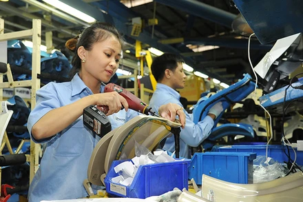 Sản xuất và lắp ráp xe máy tại Công ty TNHH Piaggio Việt Nam (Khu công nghiệp Bình Xuyên, tỉnh Vĩnh Phúc). Ảnh | TRẦN HẢI