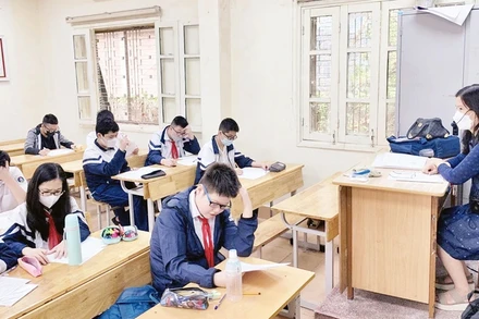 Giờ ôn tập của học sinh lớp 9 Trường THCS Hoàn Kiếm, Hà Nội. Ảnh: DIỆP TRANG