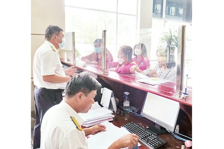 Doanh nghiệp làm thủ tục kê khai thuế tại Cục Thuế Thành phố Hồ Chí Minh.