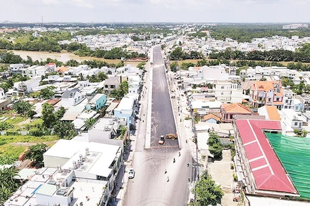 Cầu Long Kiểng (huyện Nhà Bè), một công trình giao thông quan trọng vừa được hoàn thành. (Ảnh THẾ ANH)