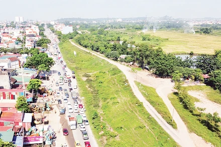 Dự án cải tạo, nâng cấp Quốc lộ 6, đoạn Ba La - Xuân Mai đang được huyện Chương Mỹ tập trung giải phóng mặt bằng. (Ảnh BẢO NHI)