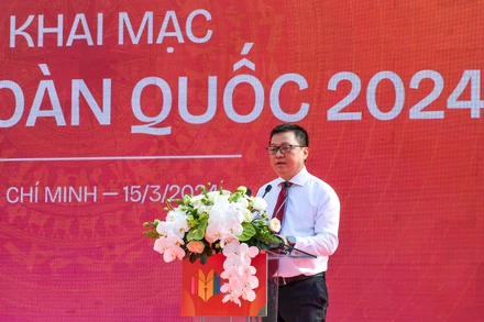 Đồng chí Lê Quốc Minh, Ủy viên Ban Chấp hành Trung ương Đảng, Tổng Biên tập Báo Nhân Dân, Phó Trưởng Ban Tuyên giáo Trung ương, Chủ tịch Hội Nhà báo Việt Nam phát biểu khai mạc Hội Báo toàn quốc năm 2024. (Ảnh: Thành Đạt)