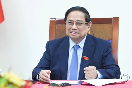 Thủ tướng Phạm Minh Chính điện đàm với Thủ tướng nước Cộng hòa Singapore Lawrence Wong.