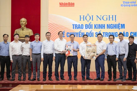 Báo Nhân Dân và Tạp chí Cộng sản trao đổi kinh nghiệm về chuyển đổi số báo chí
