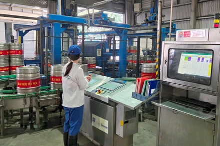 Dây chuyền sản xuất bia tại Tổng công ty CP Bia - Rượu - Nước giải khát Hà Nội (Habeco). 