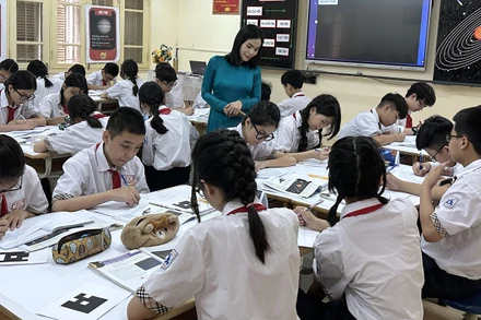 Giờ học môn Khoa học tự nhiên lớp 6 tại Trường trung học cơ sở Bế Văn Ðàn (quận Ðống Ða, Hà Nội). (Ảnh THÚY QUỲNH)