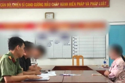 Bà N.T.M.H tại Cơ quan Công an.