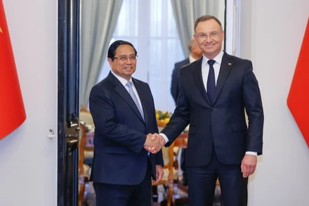 Thủ tướng Chính phủ Phạm Minh Chính và Tổng thống Ba Lan Andrzej Duda (Ảnh: NHẬT BẮC/VGP).