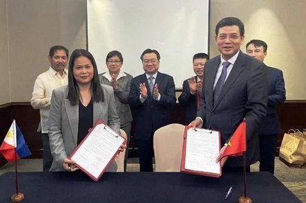 Quang cảnh lễ ký thỏa thuận.