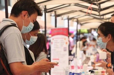 Người dân Thái Lan tại 1 hội chợ việc làm tổ chức tại Bangkok. (Ảnh: Bưu điện Bangkok)