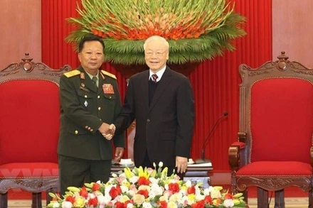 Tổng Bí thư Nguyễn Phú Trọng tiếp Đại tướng Chansamon Chanylath - Ủy viên Bộ Chính trị, Phó Thủ tướng, Bộ trưởng Bộ Quốc phòng Lào tại Trụ sở Trung ương Đảng, chiều 7/12/2022. (Ảnh: Trí Dũng/TTXVN)