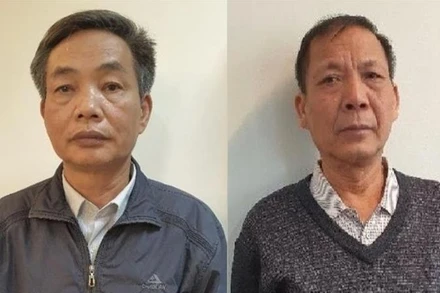 Bị can Đặng Ngọc Cầm (bên trái) và bị can Nguyễn Quốc Khánh (bên phải).