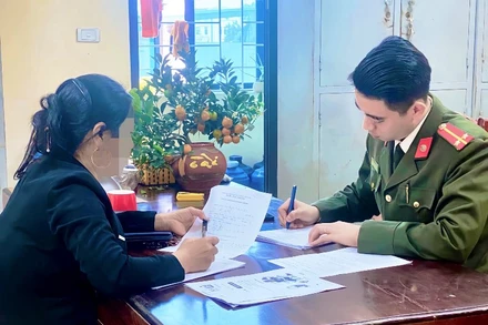 Chị T.T.P. tại cơ quan Công an. 