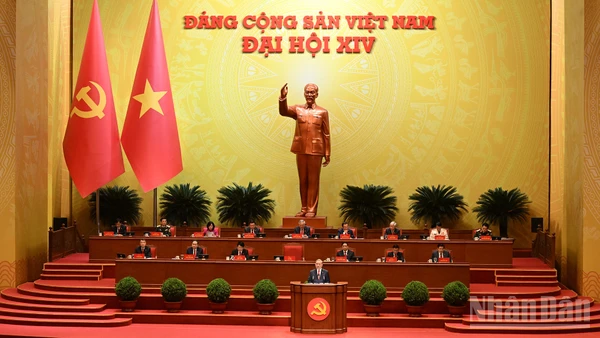 Tổng Bí thư Tô Lâm Báo cáo về các văn kiện trình Đại hội XIV Đảng Cộng sản Việt Nam tại phiên khai mạc Đại hội đại biểu toàn quốc lần thứ XIV Đảng Cộng sản Việt Nam. (Ảnh: TRẦN HẢI)