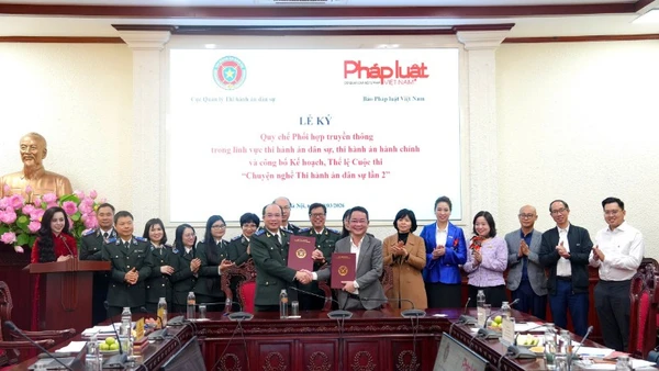 Quang cảnh buổi lễ ký kết và công bố Thể lệ Cuộc thi "Chuyện nghề thi hành án dân sự" lần thứ 2.(Ảnh: TL)