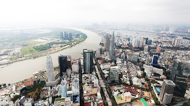 Thành phố Hồ Chí Minh đang nỗ lực cải thiện môi trường đầu tư kinh doanh để hỗ trợ cộng đồng doanh nghiệp. Ảnh: KHIẾU MINH 231.jpg