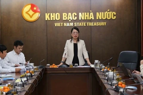 Phó Giám đốc Kho bạc Nhà nước Ngô Thị Nhung thông tin với báo chí về kết quả hoạt động của Kho bạc Nhà nước năm 2025, định hướng năm 2026.