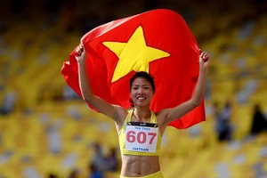 Bùi Thị Thu Thảo ăn mừng khi giành HCV ASIAD 2018. Ảnh | DŨNG PHƯƠNG