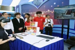 Trải nghiệm công nghệ tại triển lãm trong khuôn khổ lễ phát động phong trào “Cả nước thi đua đổi mới sáng tạo và chuyển đổi số” tại Học viện Công nghệ Bưu chính Viễn thông.
