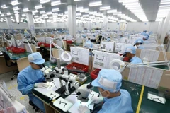 Sau gần 40 năm đổi mới, Việt Nam đã trở thành một trong những quốc gia thu hút đầu tư trực tiếp nước ngoài (FDI) thành công nhất trong khu vực. (Ảnh: Báo Nhân Dân)