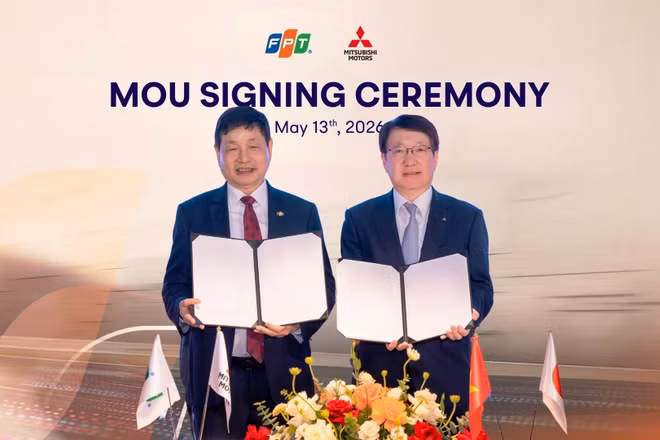 Ông Trương Gia Bình, Chủ tịch Hội đồng quản trị FPT và ông Takao Kato, Thành viên Hội đồng quản trị, Tổng Giám đốc Tập đoàn Mitsubishi Motors tại lễ ký kết.