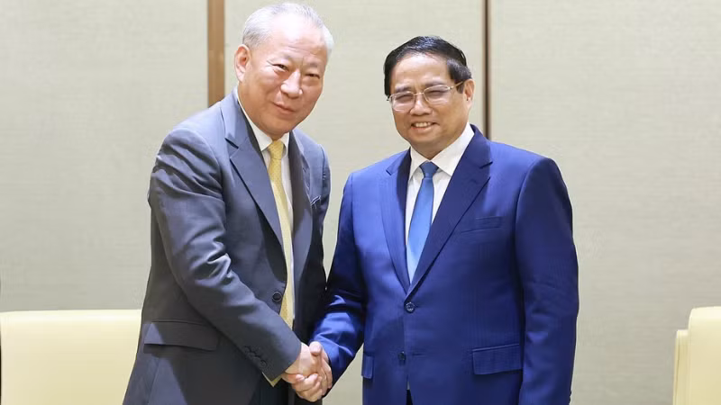 Thủ tướng Phạm Minh Chính tiếp Chủ tịch Tập đoàn xây dựng Thái Bình Dương Nghiêm Giới Hoà. (ẢNH: TTXVN)