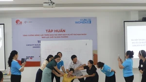 Tập huấn triển khai mô hình GBV tại Quảng Bình. Ảnh: VĂN BAN