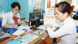 Thị trường tài chính tiêu dùng Việt Nam thu hút sự quan tâm đặc biệt từ các nhà đầu tư nước ngoài. Ảnh: NGUYỆT ANH
