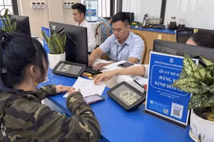 Không chỉ tinh gọn bộ máy, mô hình chính quyền địa phương hai cấp đang tạo những chuyển biến tích cực. (Ảnh: TTXVN)