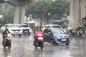Khu vực Hà Nội sáng có mưa vừa, mưa to và dông, cục bộ có nơi mưa rất to. (Ảnh minh họa: Đ.T)