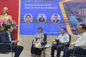 Tọa đàm “Xác lập thể chế đặc thù, vượt trội để phát triển Thủ đô trong kỷ nguyên mới”. 