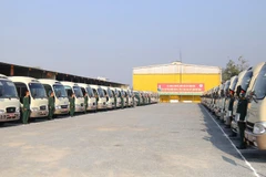 Đội hình xe ô-tô thực hiện nhiệm vụ đưa đón đại biểu dự Đại hội Đại biểu toàn quốc lần thứ XIV của Đảng.